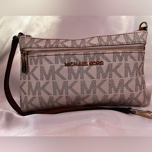 Small Tan and Brown Michael Kors Clutch, Good condition